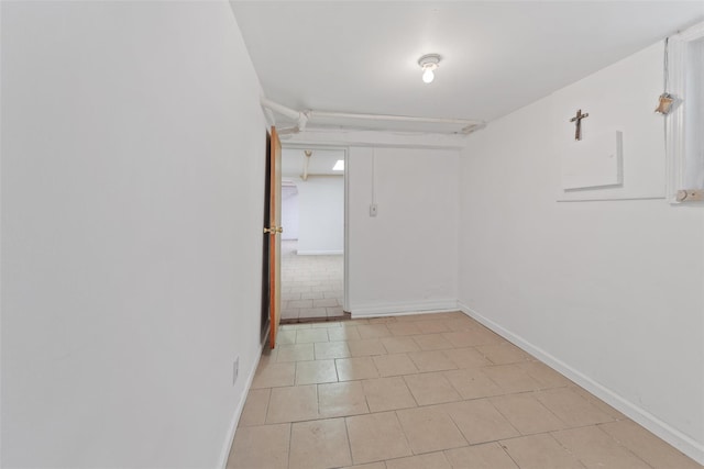 1856 Edison Ave, Bronx, NY 10461 - spare room with light tile patterned floors and baseboards