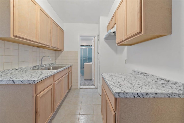 1856 Edison Ave, Bronx, NY 10461 - kitchen featuring a sink, light brown cabinets, light countertops, light tile patterned floors, and decorative backsplash