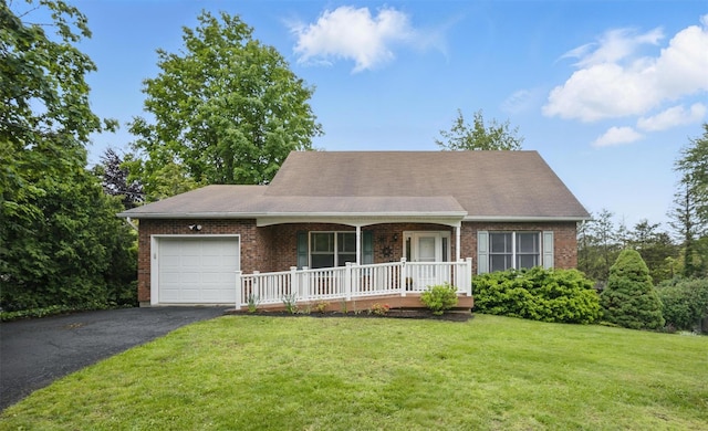 7 Mailler Ave, Cornwall, NY 12518 - view of front of home featuring covered porch, a garage, driveway, brick siding, and a front yard