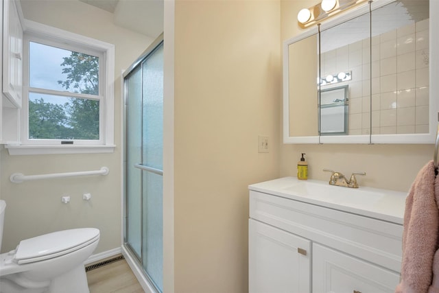 7 Mailler Ave, Cornwall, NY 12518 - bathroom featuring toilet, a shower with door, and vanity
