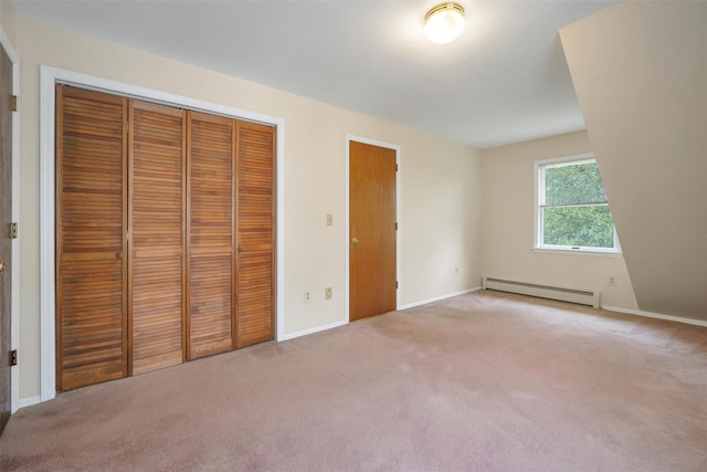 7 Mailler Ave, Cornwall, NY 12518 - unfurnished bedroom featuring baseboard heating, carpet flooring, a closet, and baseboards