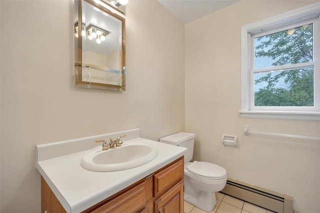 7 Mailler Ave, Cornwall, NY 12518 - bathroom with a baseboard heating unit, vanity, toilet, tile patterned flooring, and a shower