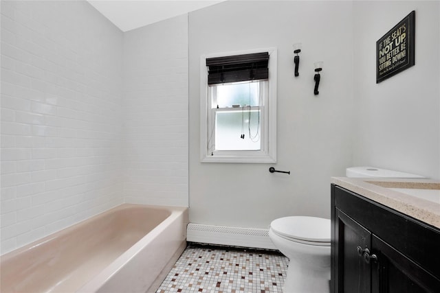 651 Hyman Ave, Bay Shore, NY 11706 - full bath with a baseboard radiator, vanity, toilet, and tile patterned floors