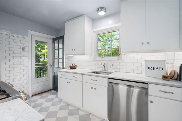 3 Reigate Pl, Suffern, NY 10901 - kitchen with stainless steel dishwasher, a sink, plenty of natural light, and decorative backsplash
