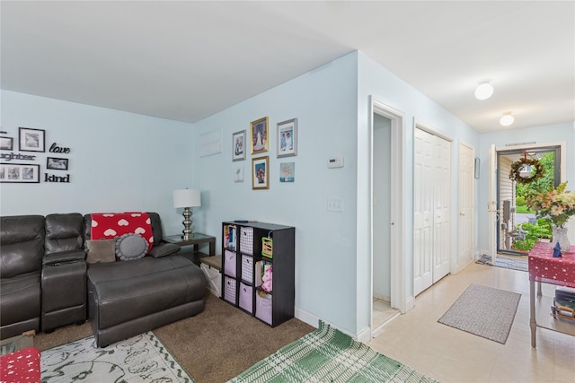 32 Blueberry Cmn, Riverhead, NY 11901 - living room with baseboards