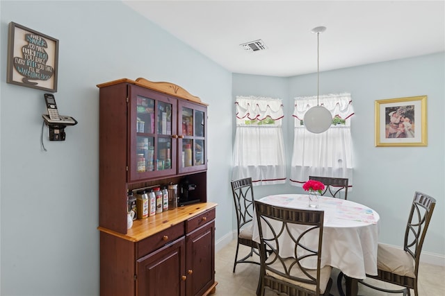 32 Blueberry Cmn, Riverhead, NY 11901 - dining space featuring baseboards