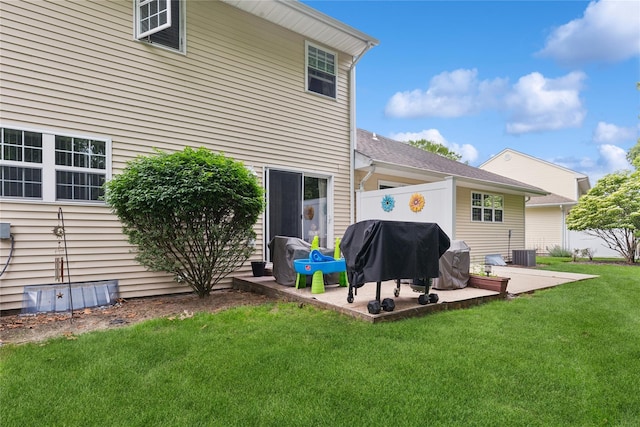 32 Blueberry Cmn, Riverhead, NY 11901 - back of house featuring a patio area
