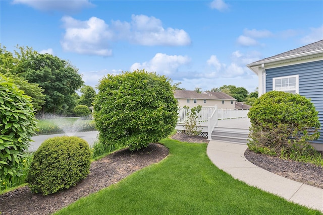 32 Blueberry Cmn, Riverhead, NY 11901 - view of grassy yard with a deck