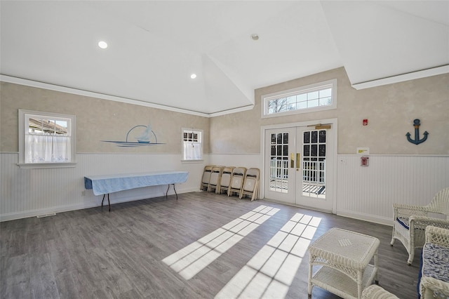 32 Blueberry Cmn, Riverhead, NY 11901 - living room with wainscoting, french doors, wood finished floors, and a high ceiling
