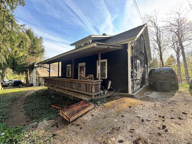 210 Seven Bridges Rd Unit A, Mount Kisco, NY 10549 - view of side of home featuring covered porch