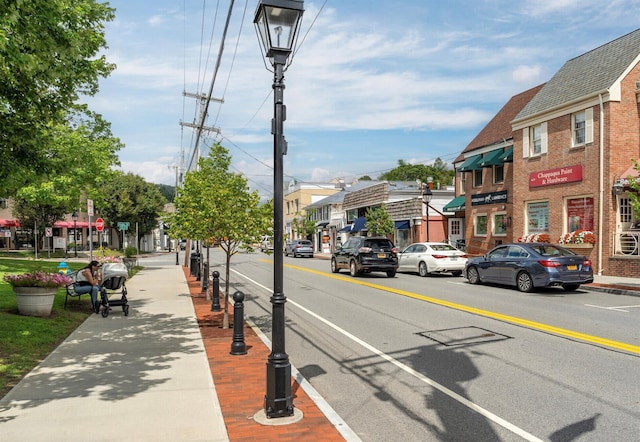 210 Seven Bridges Rd Unit A, Mount Kisco, NY 10549 - view of asphalt road featuring sidewalks, street lights, and curbs