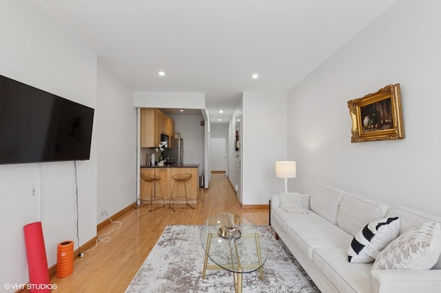 621 E 6th St # 7, New York Manhattan, NY 10009 - living room with light wood finished floors, recessed lighting, and baseboards