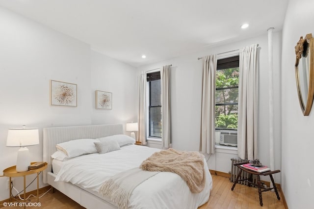 621 E 6th St # 7, New York Manhattan, NY 10009 - bedroom with light wood-style flooring, recessed lighting, cooling unit, and baseboards