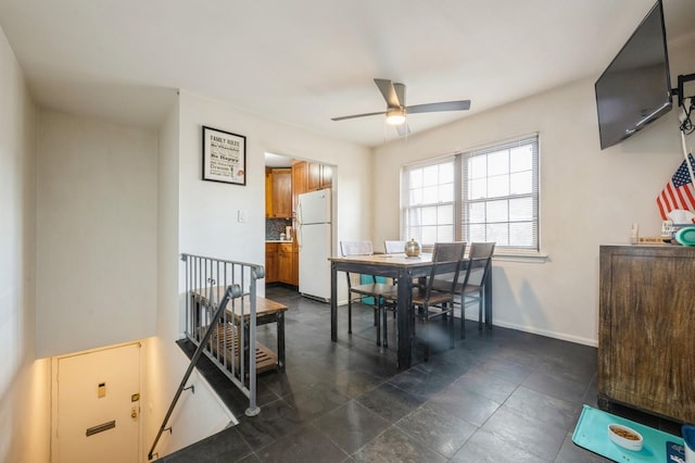 240 Mariners Way, Copiague, NY 11726 - dining space featuring a ceiling fan and baseboards