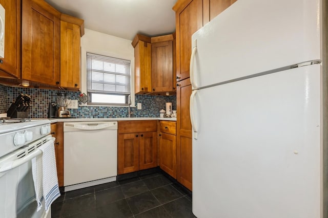 240 Mariners Way, Copiague, NY 11726 - kitchen featuring white appliances, light countertops, brown cabinets, decorative backsplash, and dark tile patterned flooring