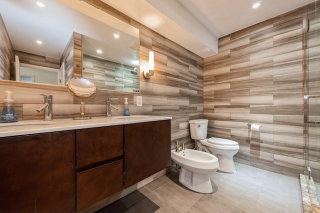 240 Mariners Way, Copiague, NY 11726 - full bath featuring a bidet, tile walls, toilet, double vanity, and tile patterned flooring