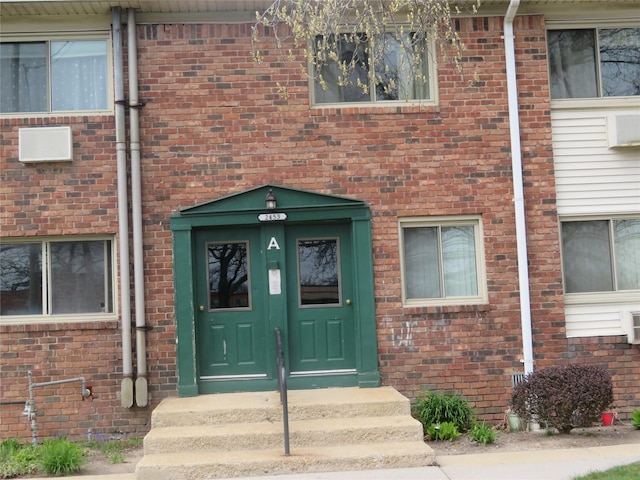 2453A Union Blvd Unit 21A, Islip, NY 11751 - view of exterior entry with brick siding