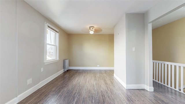 105 Pilgrim Pl, Valley Stream, NY 11580 - empty room featuring radiator, wood finished floors, baseboards, and ceiling fan