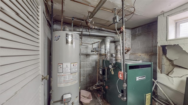 105 Pilgrim Pl, Valley Stream, NY 11580 - utility room featuring gas water heater and a heating unit