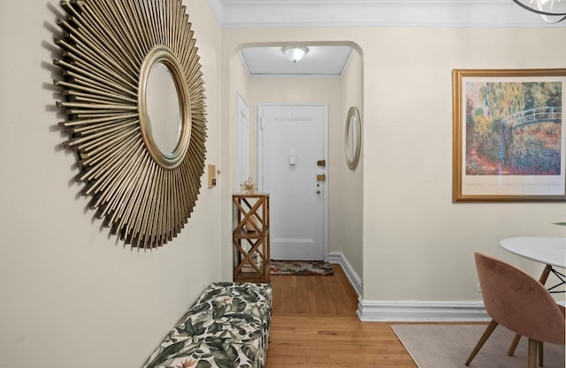 1 Bronxville Rd Unit 6M, Bronxville, NY 10708 - foyer entrance featuring wood finished floors, baseboards, arched walkways, and ornamental molding