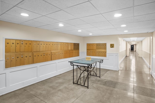 1 Bronxville Rd Unit 6M, Bronxville, NY 10708 - recreation room with mail area, recessed lighting, wainscoting, a decorative wall, and a drop ceiling