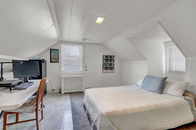 61 Maple Dr, New Hyde Park, NY 11040 - bedroom with lofted ceiling, a desk, and radiator