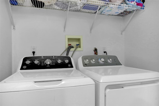 61 Maple Dr, New Hyde Park, NY 11040 - laundry room featuring washer and clothes dryer