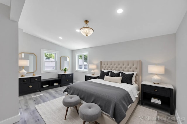 63 Ridgeway Ave, Setauket, NY 11733 - bedroom featuring light wood finished floors, lofted ceiling, baseboards, and recessed lighting