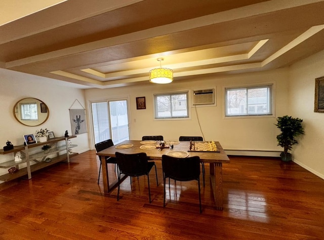 146 Grand Blvd, Brentwood, NY 11717 - dining area with a tray ceiling, a baseboard heating unit, wood finished floors, an AC wall unit, and baseboards