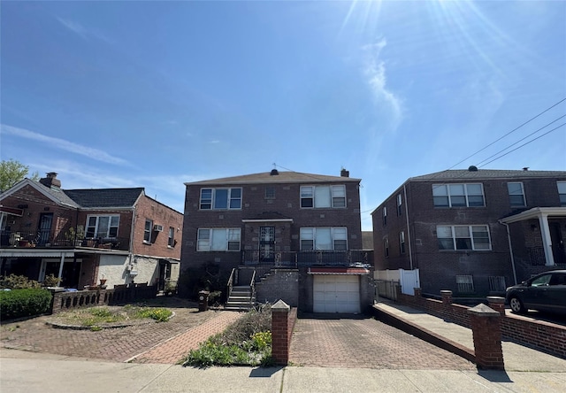 1208 Astor Ave, Bronx, NY 10469 - multi unit property with a garage and decorative driveway