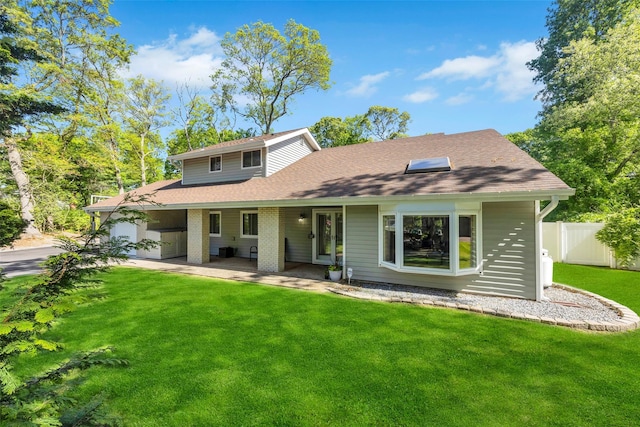 5 Firwood Dr, Farmingville, NY 11738 - view of front of home with solar panels and a shingled roof