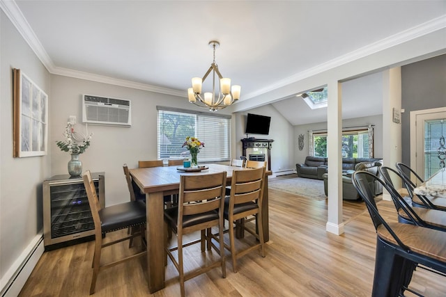 5 Firwood Dr, Farmingville, NY 11738 - dining room featuring a baseboard heating unit, light wood-style floors, a chandelier, a wall mounted AC, and a skylight