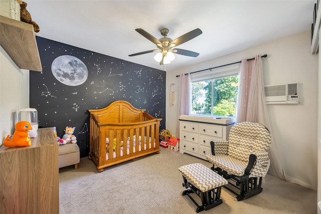 5 Firwood Dr, Farmingville, NY 11738 - carpeted bedroom with an AC wall unit, wallpapered walls, an accent wall, a crib, and a ceiling fan