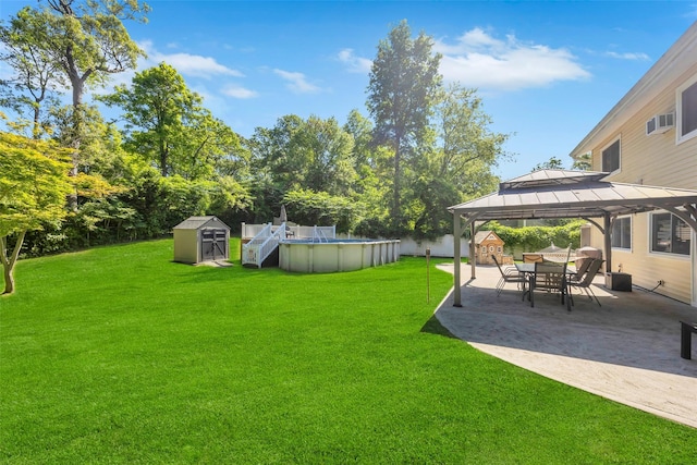 5 Firwood Dr, Farmingville, NY 11738 - view of grassy yard with a gazebo, an outdoor pool, and a patio area