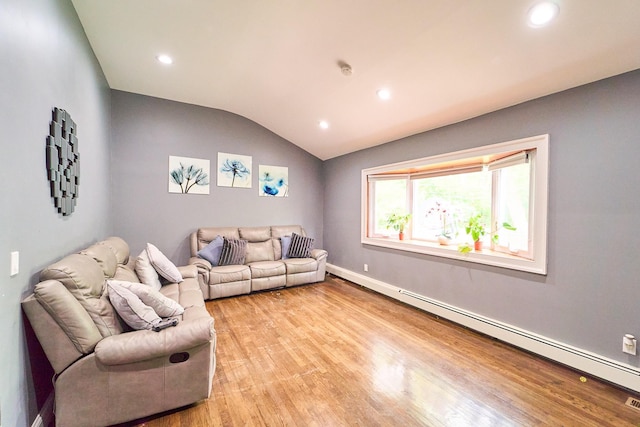 2 Hawthorne St, Farmingdale, NY 11735 - living room with a baseboard radiator, light wood-style floors, vaulted ceiling, recessed lighting, and baseboards