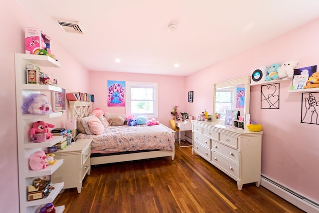 2 Hawthorne St, Farmingdale, NY 11735 - bedroom featuring a baseboard heating unit, multiple windows, wood finished floors, and recessed lighting