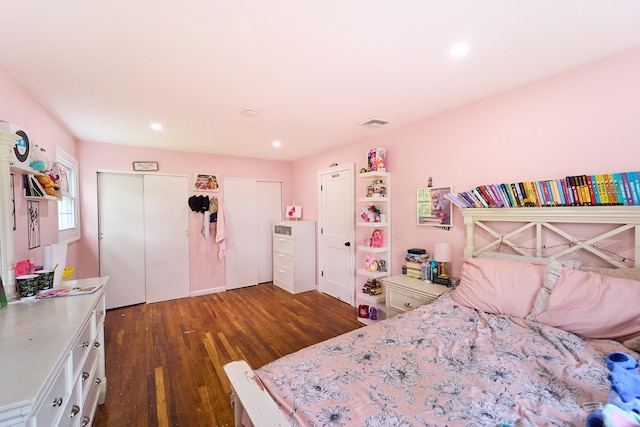 2 Hawthorne St, Farmingdale, NY 11735 - bedroom with two closets, dark wood-type flooring, and recessed lighting