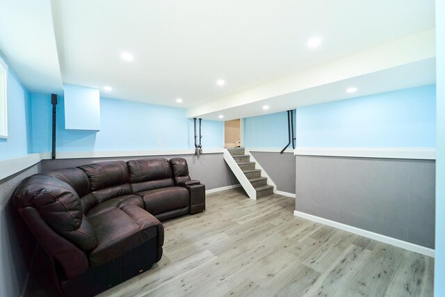 2 Hawthorne St, Farmingdale, NY 11735 - living area with light wood finished floors, stairs, baseboards, and recessed lighting
