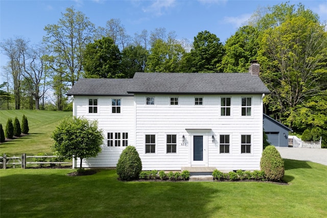 620 Rte 343, Millbrook, NY 12545 - colonial-style house with a chimney, roof with shingles, and a garage
