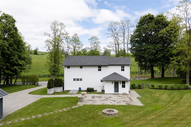 620 Rte 343, Millbrook, NY 12545 - rear view of property with a patio, a fire pit, a chimney, and roof with shingles