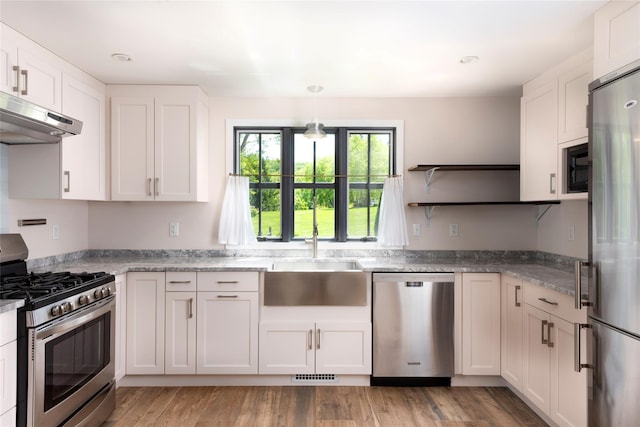 620 Rte 343, Millbrook, NY 12545 - kitchen featuring appliances with stainless steel finishes, a sink, under cabinet range hood, and white cabinetry