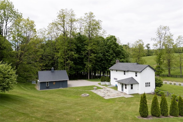 620 Rte 343, Millbrook, NY 12545 - view of yard featuring a patio, an outdoor structure, driveway, and a fire pit