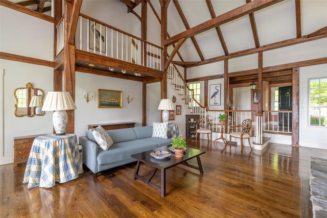 139 Charlie Hill Rd, Millerton, NY 12546 - living area featuring high vaulted ceiling, stairs, and wood finished floors