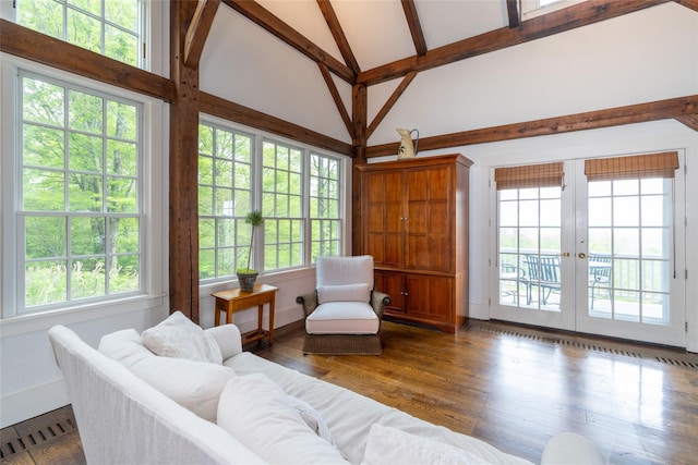 139 Charlie Hill Rd, Millerton, NY 12546 - living room with high vaulted ceiling, french doors, beam ceiling, dark wood finished floors, and baseboards