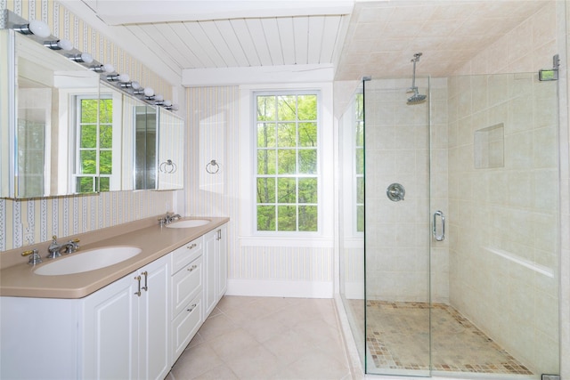 139 Charlie Hill Rd, Millerton, NY 12546 - bathroom featuring a stall shower, double vanity, tile patterned floors, and wallpapered walls