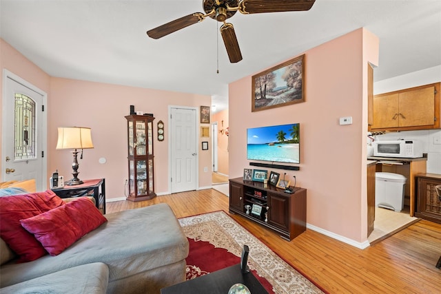 397 Mine Rd, Monroe, NY 10950 - living room featuring light wood-type flooring, a ceiling fan, and baseboards