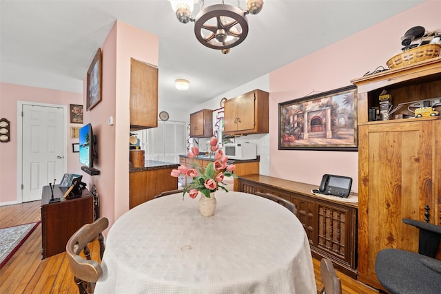 397 Mine Rd, Monroe, NY 10950 - dining room featuring a chandelier and light wood-style flooring