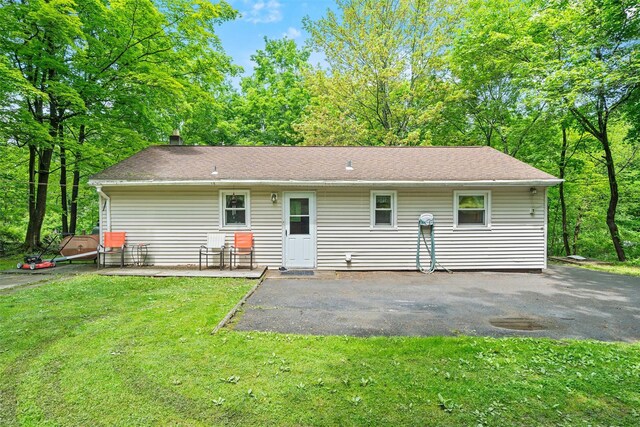 397 Mine Rd, Monroe, NY 10950 - back of house featuring a patio area and a yard