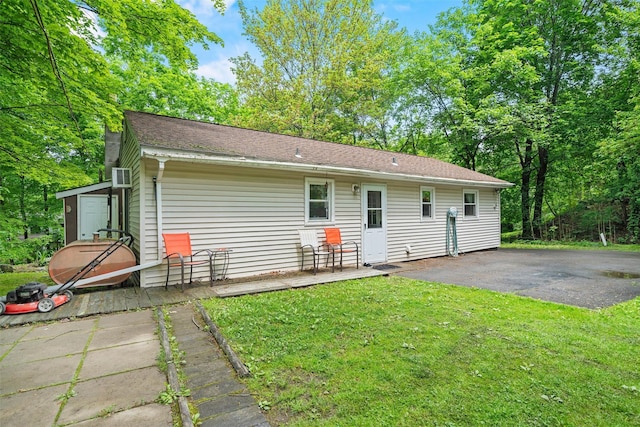 397 Mine Rd, Monroe, NY 10950 - rear view of house featuring a yard and a patio