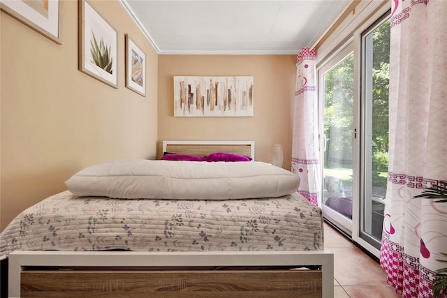 15 W Forest Ave, Freeport, NY 11520 - bedroom featuring access to exterior, ornamental molding, and tile patterned floors
